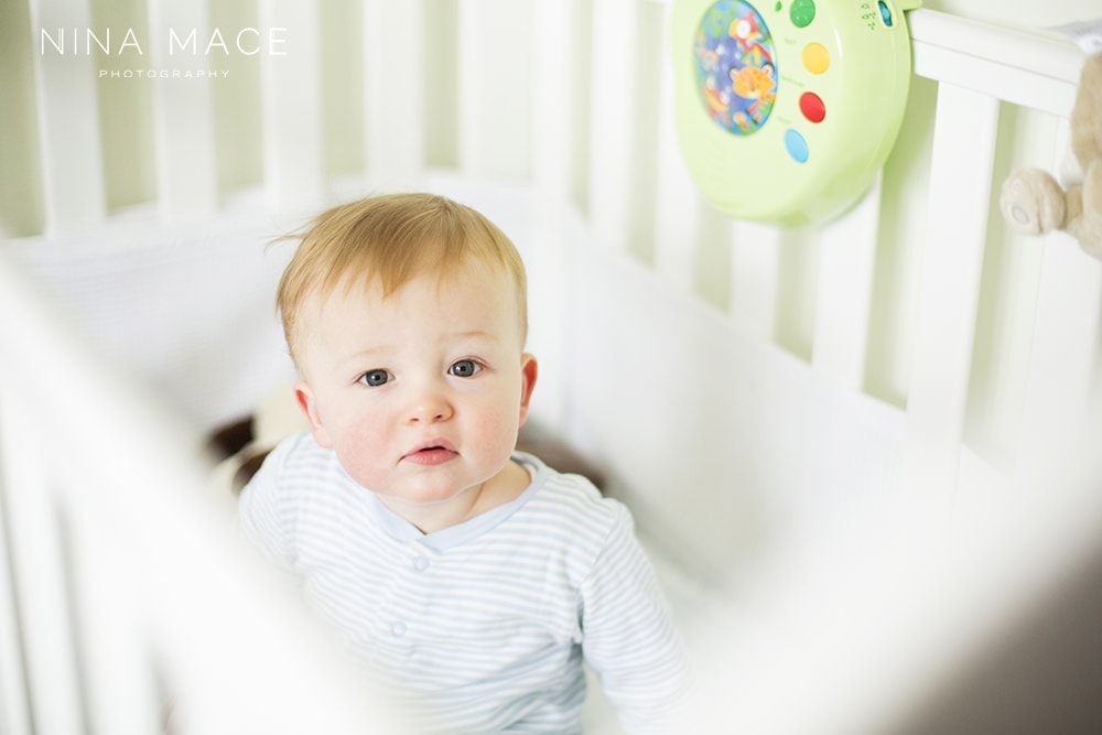 photographing babies in cots