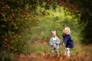 kids in leaves