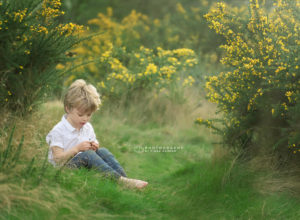 Boy in green grass